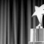 9715686-star-award-against-curtain-background